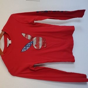 Red long sleeve women's top.